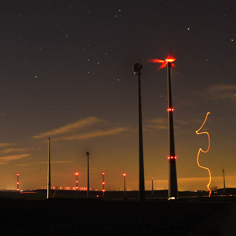 Windfarms near Paderborn with obstruction lights at night