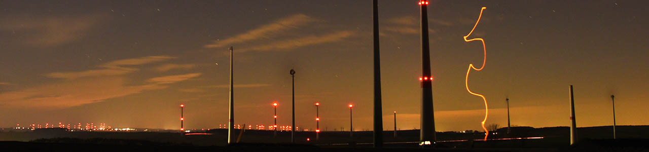 Wind farms near Paderborn with obstruction lighting at night